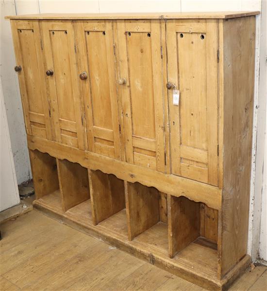 An early 20th century bank of pine golf lockers W.160cm